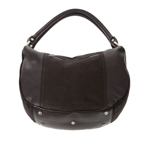 arcadia handbags official website.